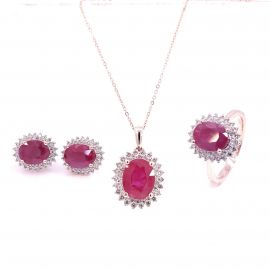 Oval Ruby Pendant Set Surrounded With Diamonds in 14K Gold